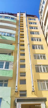Коллективный коаксиальный дымоход из нержавеющей стали — фото с объекта